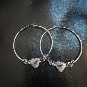 Juicy silver hoop earrings